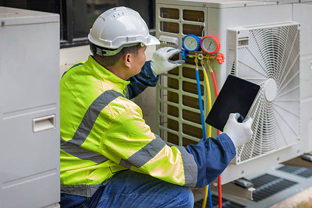 Professional Heat Pump Repair technician working in Peterboro, NY
